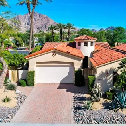 Rent this 4 bed house on 50078 Valencia Court in La Quinta, CA 92253