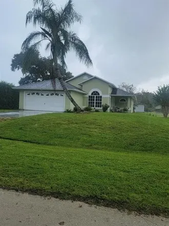 Rent this 3 bed house on 8880 104th Court in Vero Lake Estates, Indian River County