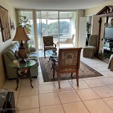 Buy this 2 bed condo on Palm Aire Country Club in Cypress Grove Lane, Pompano Beach