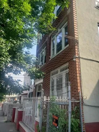 Buy this 12 bed townhouse on 469 East 49th Street in New York, NY 11203