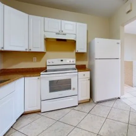 Buy this 4 bed apartment on 1028 Long Island Avenue in Melrose Park, Fort Lauderdale