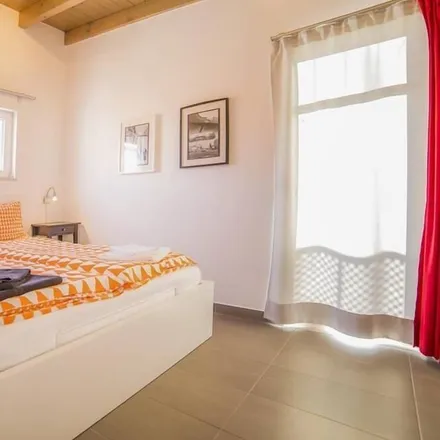 Rent this 1 bed townhouse on Largo das Portas de Portugal in 8600-682 Lagos, Portugal
