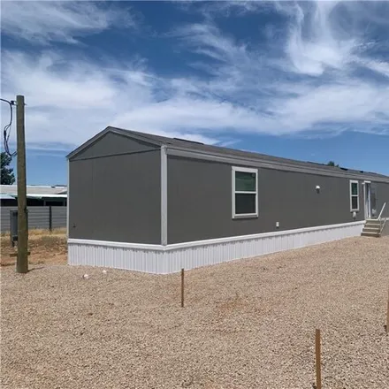 Buy this studio apartment on 3816 Thompson Avenue in New Kingman-Butler, Mohave County