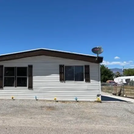Buy this studio apartment on 214 Russell Road in Pahrump, NV 89048