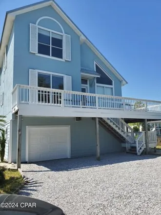 Rent this 3 bed house on 4015 West 27th Court in Bayview, Panama City