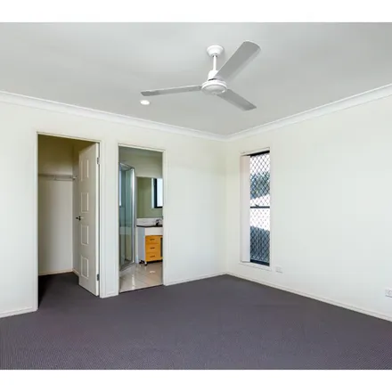 Rent this 4 bed apartment on Lakes Entrance Drive in Springfield Lakes QLD 4300, Australia