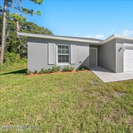 Buy this 4 bed house on 1047 Pace Drive Northwest in Palm Bay, FL 32907