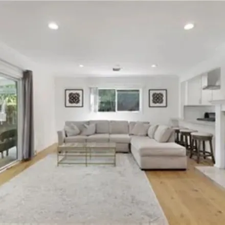 Rent this 4 bed apartment on 22335 Kittridge Street in Los Angeles, CA 91303