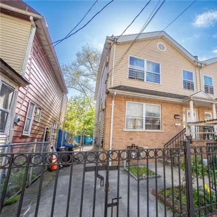 Buy this 4 bed house on 104-34 165th Street in New York, NY 11433