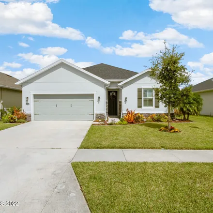 Buy this 4 bed house on 900 Potenza Drive in West Melbourne, FL 32904
