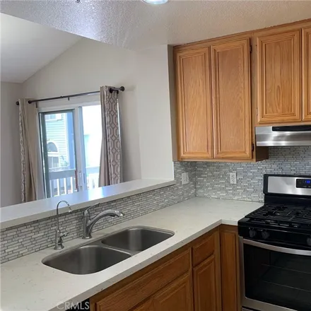 Rent this 2 bed condo on 13048 Sycamore Village Drive in Norwalk, CA 90650