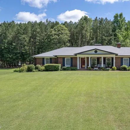 Buy this 6 bed house on 7970 Rico Road in Chattahoochee Hills, Goodes