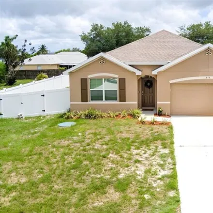 Buy this 4 bed house on 818 SW Commonwealth Rd in Port Saint Lucie, Florida