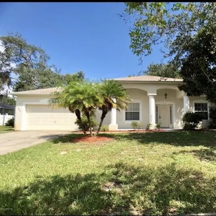Rent this 3 bed house on 3644 Hickory Park Drive in Titusville, FL 32780