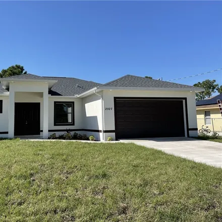 Buy this 4 bed house on 2927 17th Street Southwest in Lehigh Acres, FL 33976