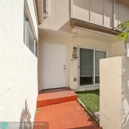 Buy this 4 bed townhouse on 800 Northwest 82nd Avenue in Plantation, FL 33324