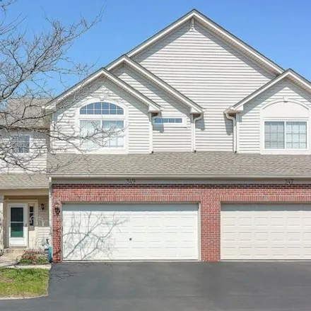Buy this 3 bed condo on 343 Abington Woods Drive in Aurora, IL 60502