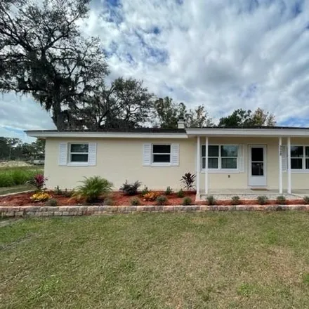 Rent this 3 bed house on 228 Green Street in Auburndale, FL 33823