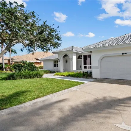 Rent this 4 bed house on 1992 South Club Drive in Wellington, Palm Beach County