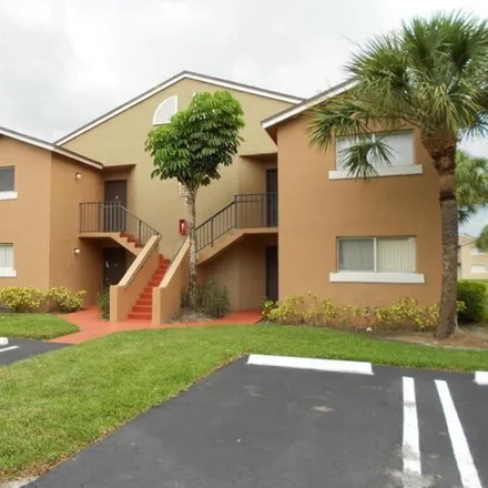 Rent this 3 bed condo on 748 Lake Terry Drive in Golden Lakes, Palm Beach County