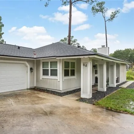Buy this 3 bed house on 64 Ravenwood Court in Ormond Beach, FL 32174