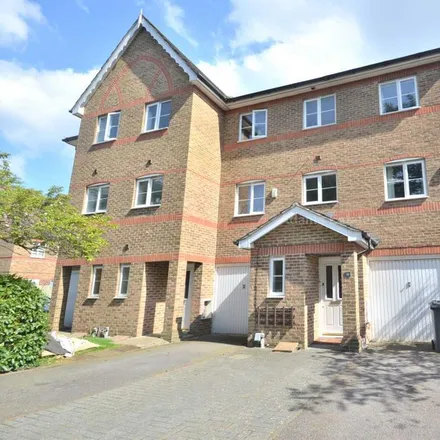 Rent this 4 bed townhouse on 12 Cintra Close in Reading, RG2 7AL