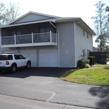 Rent this 2 bed condo on 5576 Green Shadows Place in Orlando, FL 32811