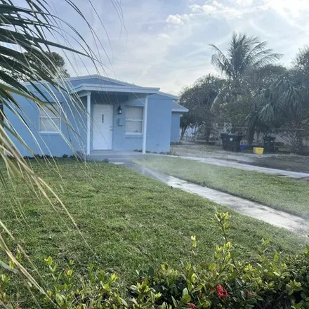 Buy this 4 bed house on 833 Truman Street in Lake Worth Beach, FL 33460