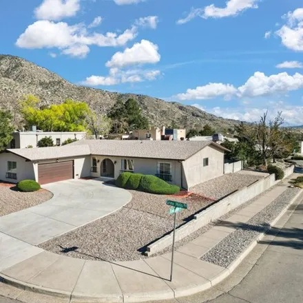 Buy this 4 bed house on 4176 Embudito Drive Northeast in Glenwood Hills, Albuquerque
