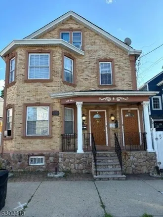 Buy this 9 bed house on 15 Ryerson Ave in Paterson, New Jersey