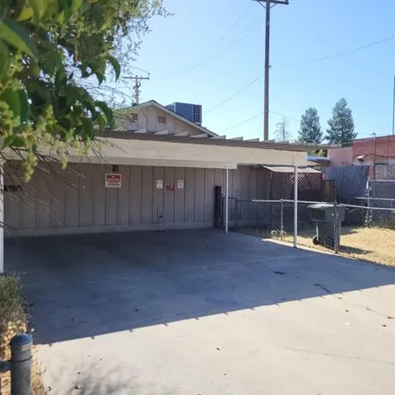 Buy this 4 bed house on 552 North College Avenue in Fresno, CA 93728