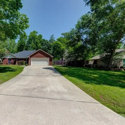 Buy this 4 bed house on 7490 Charred Pine Drive in Montgomery County, TX 77354