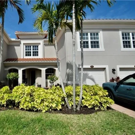Buy this 3 bed house on 8576 Violeta Street in Mirasol at Coconut Point, Lee County