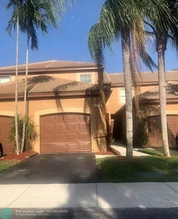 Buy this 3 bed townhouse on 1540 Barcelona Way in Weston, FL 33327