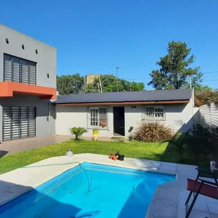 Buy this 4 bed house on Calle 316 in Partido de Berazategui, 1885 Ranelagh