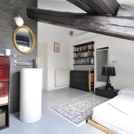 Rent this 1 bed apartment on Lovely 1-bedroom duplex in Navigli  Milan 20143