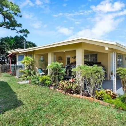 Image 4 - 691 Northeast 40th Street, Coral Heights, Oakland Park, FL 33334, USA - House for sale