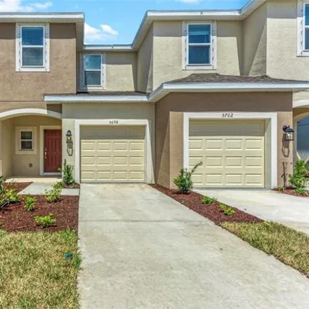 Rent this 3 bed townhouse on Archipelago Street in Laurel, Sarasota County