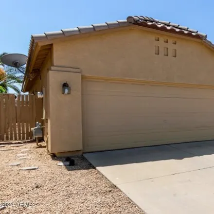Buy this 3 bed house on 8763 West Paradise Drive in Peoria, AZ 85345
