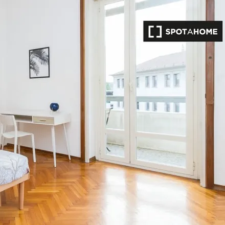 Rent this 6 bed room on Via Crocefisso in 20, 20136 Milan MI