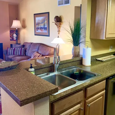 Rent this 2 bed condo on Tucson