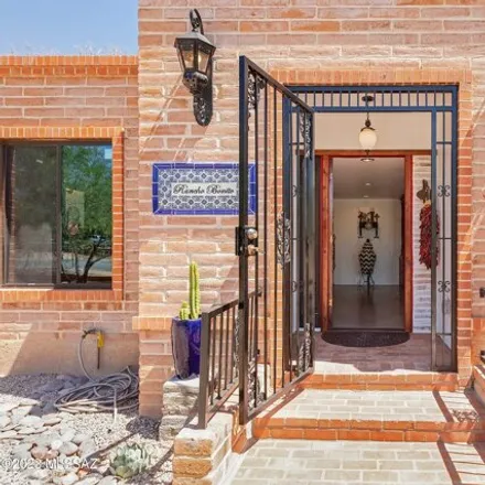 Rent this 4 bed house on 7711 East Camino Bavispe in Tucson, AZ 85715
