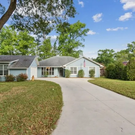 Buy this 4 bed house on 3328 Hidden Lake Drive West in Pineland Gardens, Jacksonville