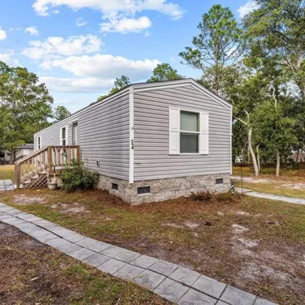Buy this studio apartment on 762 Cobia Court Southeast in Brunswick County, NC 28422