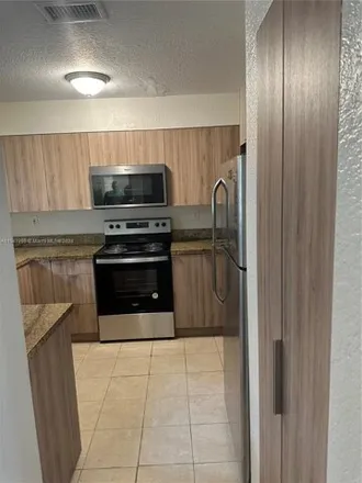Rent this 3 bed townhouse on 2776 Northwest 131st Street in Opa-locka, FL 33054