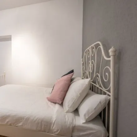 Rent this 8 bed room on Capilla de Nuestra Señora de la Soledad in Calle de Fuencarral, 44