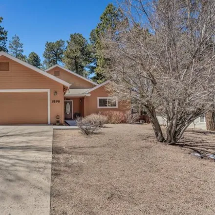 Buy this 3 bed house on 1920 West Ax Handle Way in Flagstaff, AZ 86001