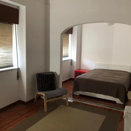 Rent this 3 bed room on Rua de João de Deus 5-11 in 1200-667 Lisbon, Portugal