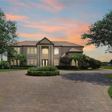 Rent this 6 bed house on 12141 Crescent Cove Court in Lake Butler, Orange County