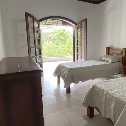 Rent this 6 bed house on Bertioga in Região Metropolitana da Baixada Santista, Brazil